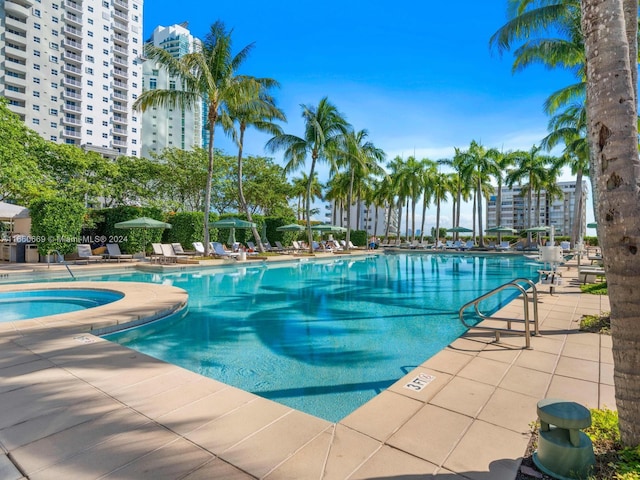 view of swimming pool featuring a patio