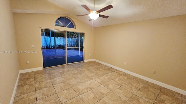 unfurnished room featuring light tile patterned floors, baseboards, lofted ceiling, and ceiling fan