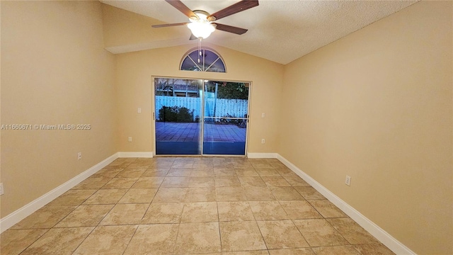 empty room with light tile patterned floors, baseboards, ceiling fan, vaulted ceiling, and a textured ceiling