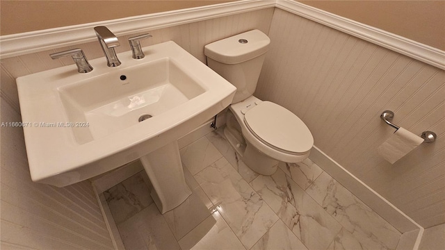 bathroom with sink and toilet