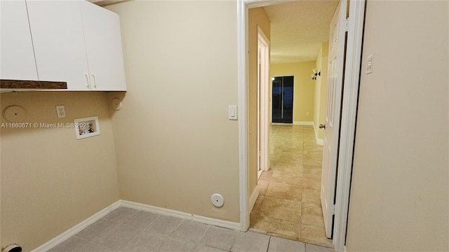 laundry room featuring baseboards, gas dryer hookup, washer hookup, and cabinet space