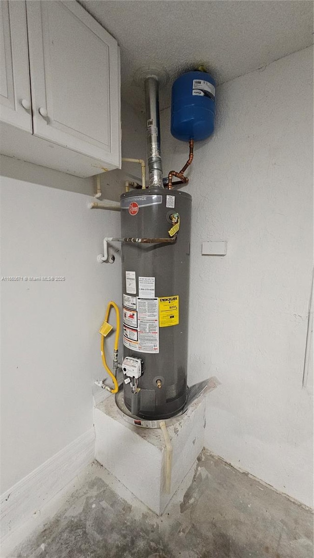 utility room with water heater