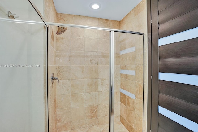 bathroom with an enclosed shower