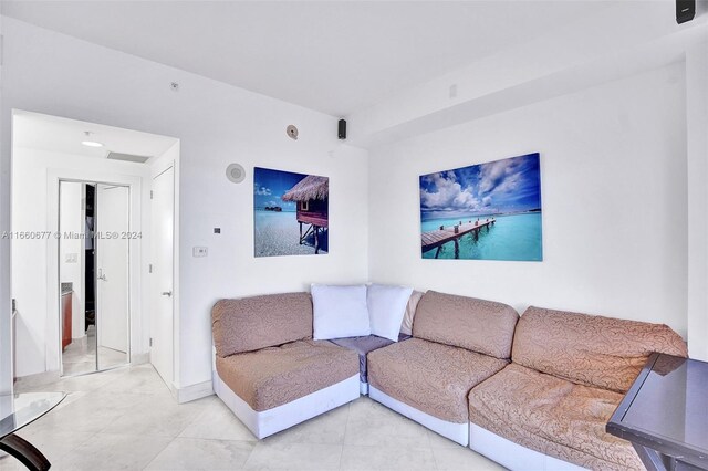 living room featuring tile patterned floors