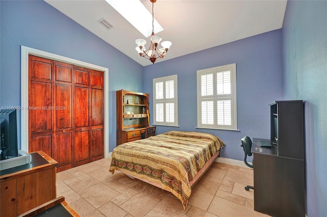 bedroom with a notable chandelier, a closet, and vaulted ceiling