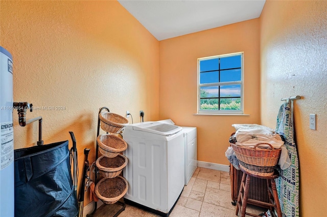 washroom featuring washer and dryer