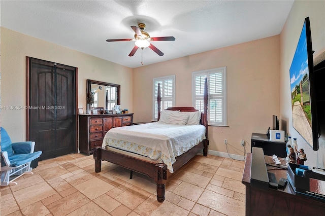 bedroom featuring ceiling fan