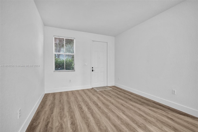 spare room with light wood-type flooring