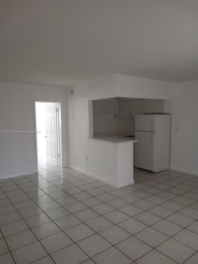 view of tiled spare room