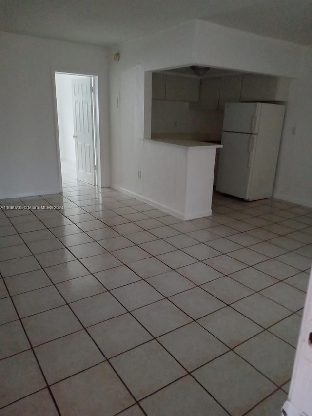 view of tiled spare room