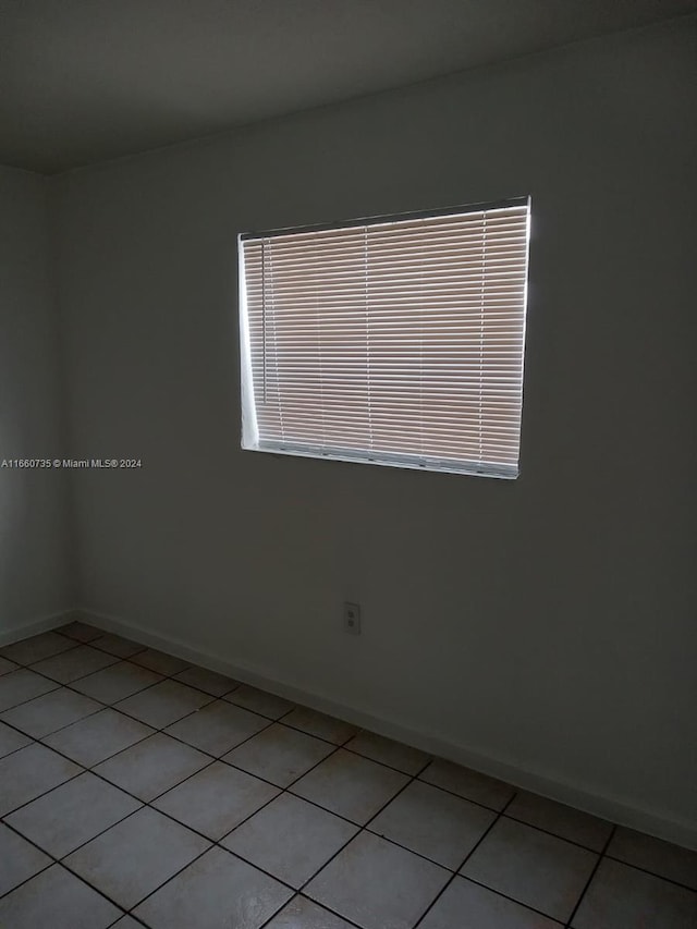 view of tiled spare room