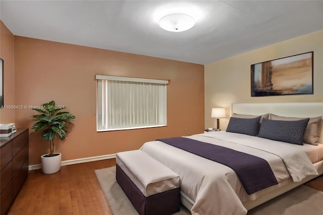 bedroom with wood-type flooring