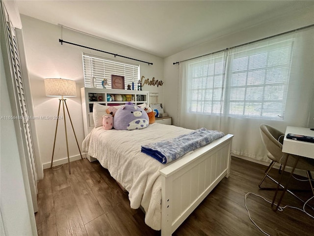 bedroom featuring dark hardwood / wood-style floors