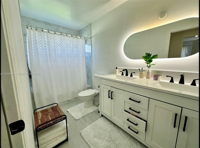 full bathroom with shower / bath combo, tile patterned flooring, vanity, and toilet