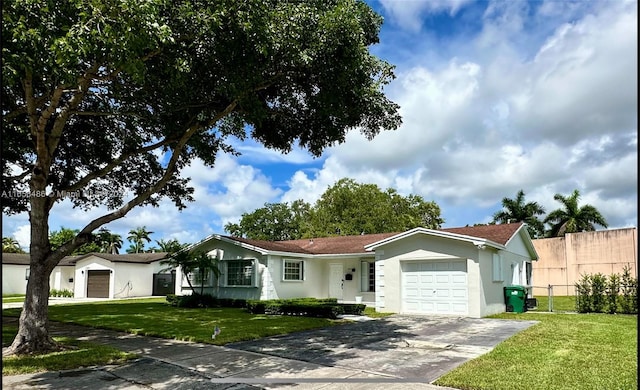 ranch-style house with a garage and a front lawn