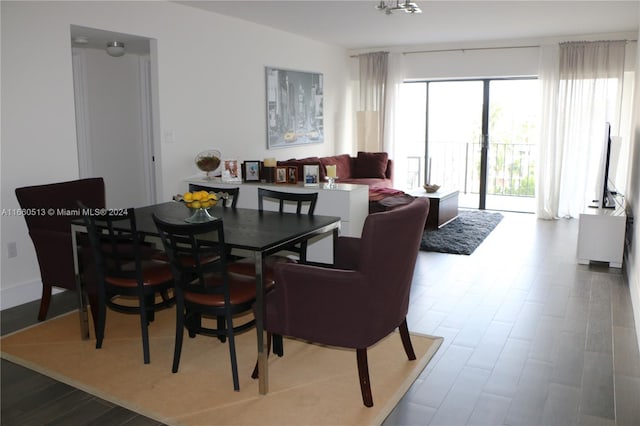 dining area with hardwood / wood-style flooring