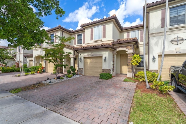 view of front of home with a garage