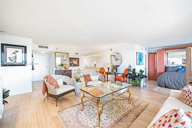 living room with light hardwood / wood-style floors