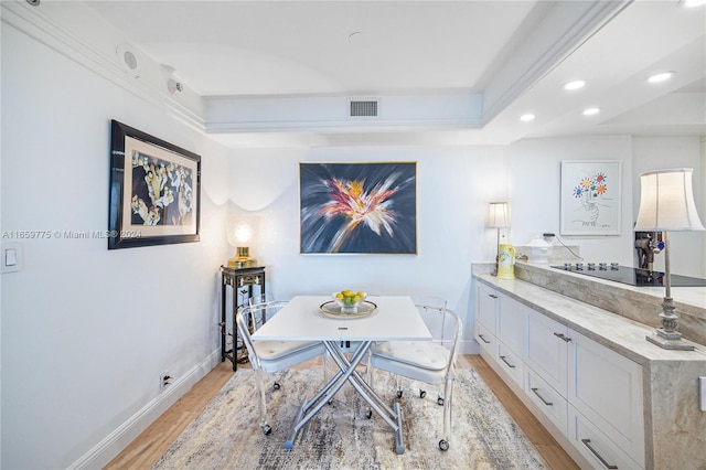 dining room featuring light hardwood / wood-style floors