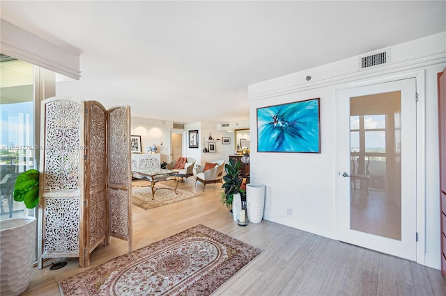 entrance foyer with hardwood / wood-style floors