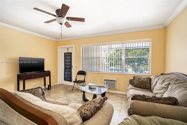 living room with a wall unit AC, ceiling fan, light tile patterned floors, and crown molding