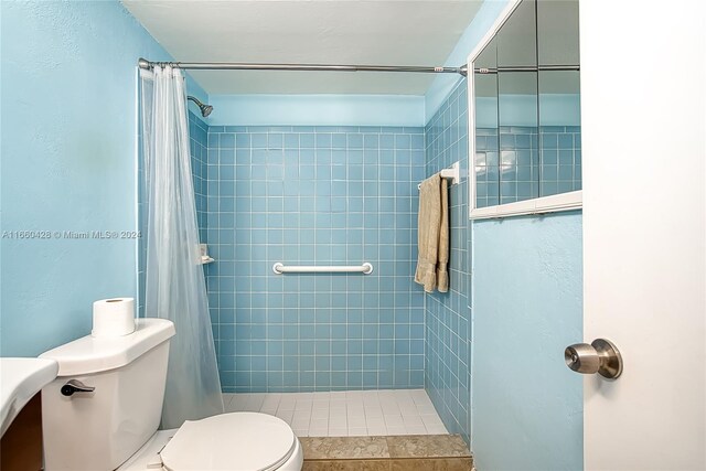 bathroom with walk in shower, toilet, and tile patterned floors