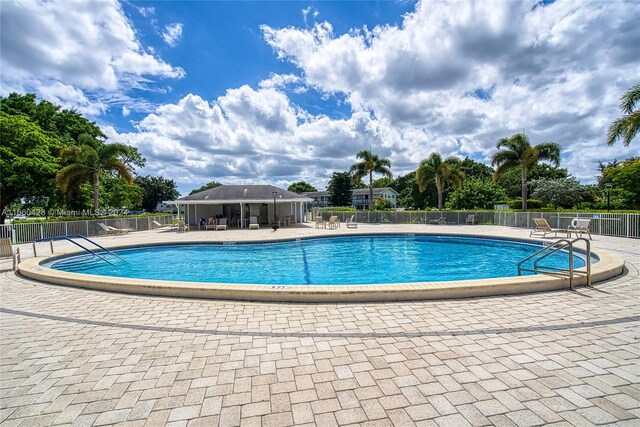 view of swimming pool featuring a patio