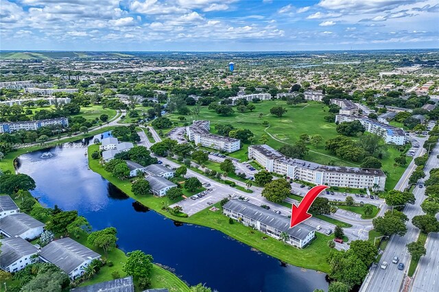 drone / aerial view with a water view