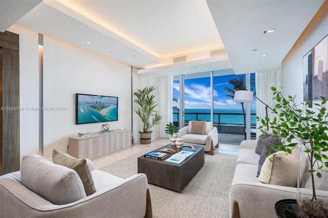 living room featuring floor to ceiling windows