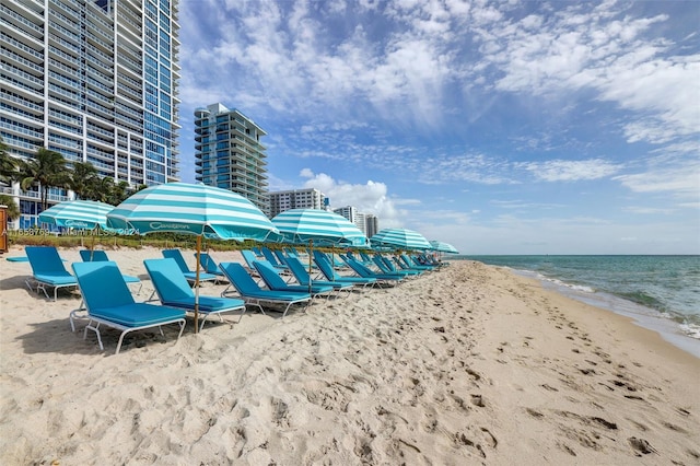 property view of water featuring a beach view