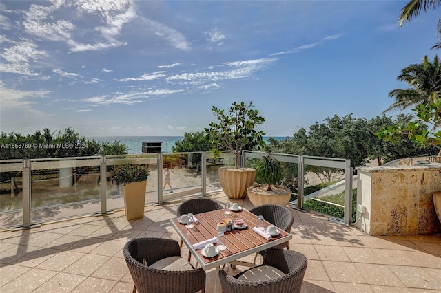 view of patio / terrace featuring a water view