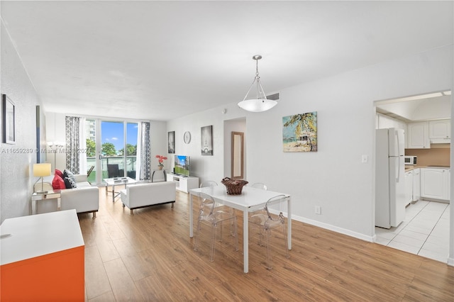 dining area featuring light hardwood / wood-style floors