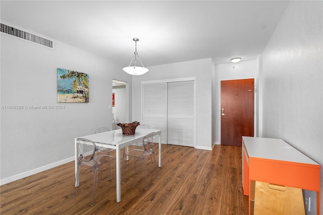 dining area featuring hardwood / wood-style flooring