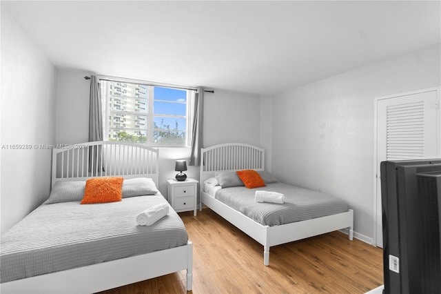 bedroom featuring light wood-type flooring