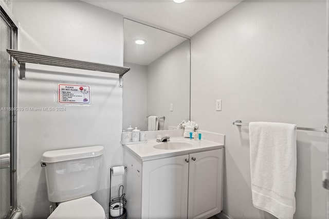 3801 S Ocean Dr Unit 2Z, Hollywood, FL 33019 - bathroom with vanity, toilet, and recessed lighting