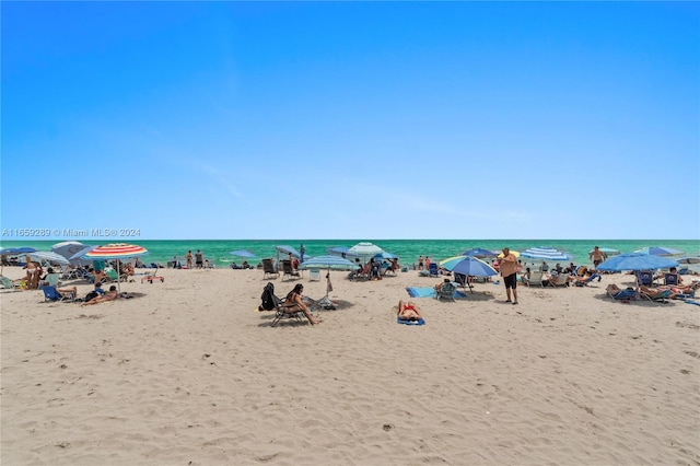 water view featuring a beach view