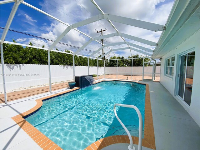 view of patio / terrace featuring a fenced in pool