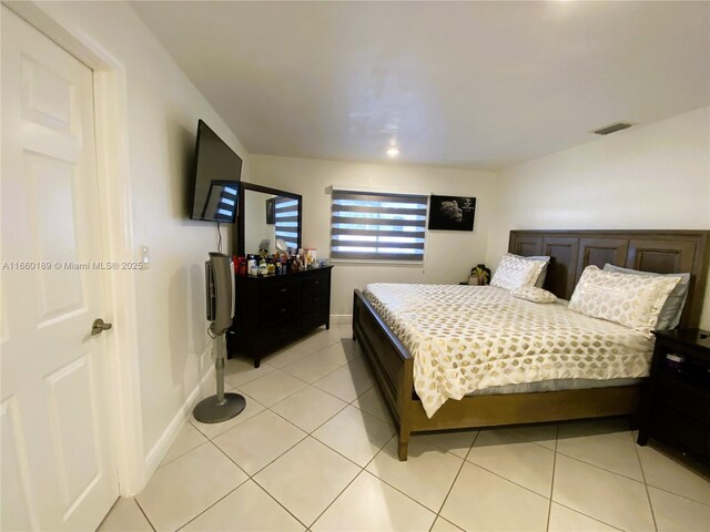 bathroom with vanity, toilet, and a shower with door