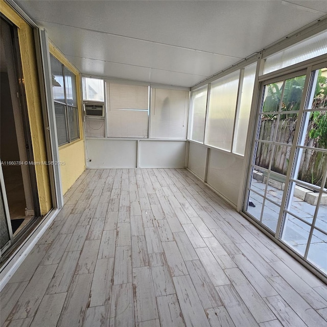 1182 W 37th Ter Unit 11, Hialeah, FL 33012 - unfurnished sunroom featuring cooling unit