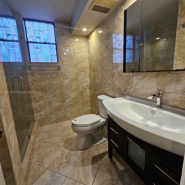 1182 W 37th Ter Unit 11, Hialeah, FL 33012 - bathroom featuring toilet, tile walls, visible vents, a shower stall, and vanity