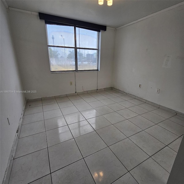 unfurnished room with light tile patterned floors