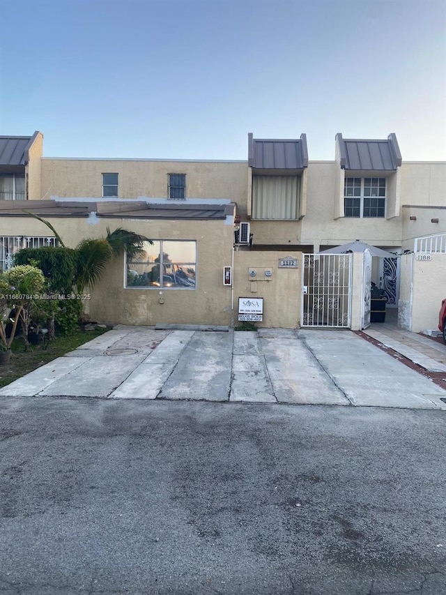 1182 W 37th Ter Unit 11, Hialeah, FL 33012 - view of property with stucco siding