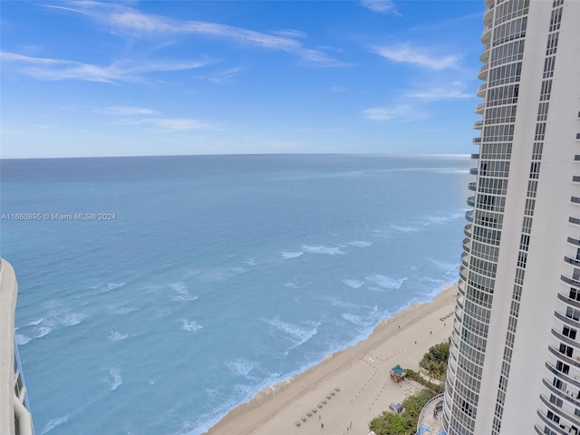 view of water feature with a beach view