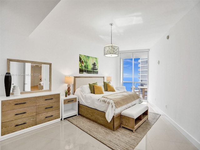 bedroom featuring a water view