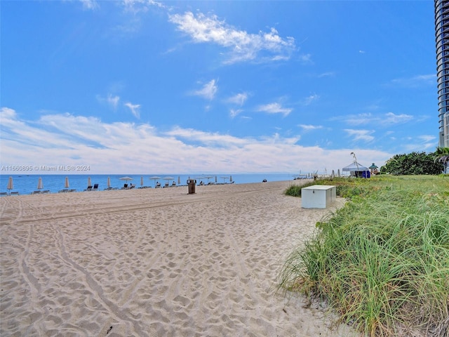 view of water feature with a beach view