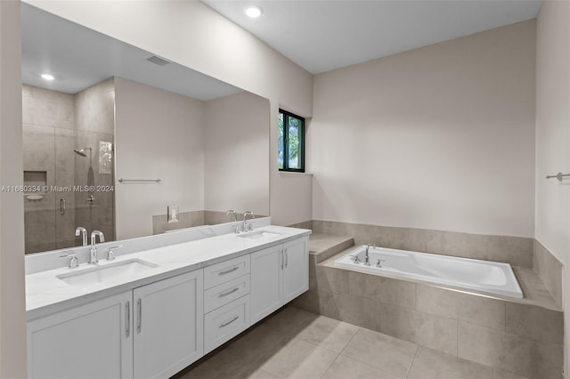 bathroom featuring vanity, separate shower and tub, and tile patterned floors