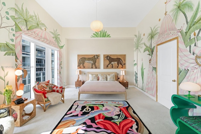 bedroom featuring carpet and baseboards