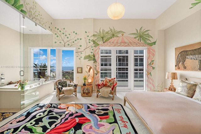 carpeted bedroom featuring access to exterior