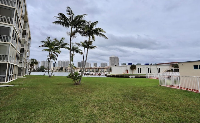 view of yard with a balcony