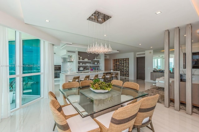 dining area with a notable chandelier